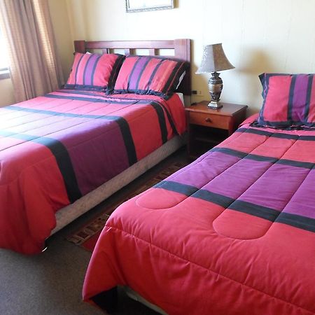 Hotel Don Teo Puerto Montt Habitación foto