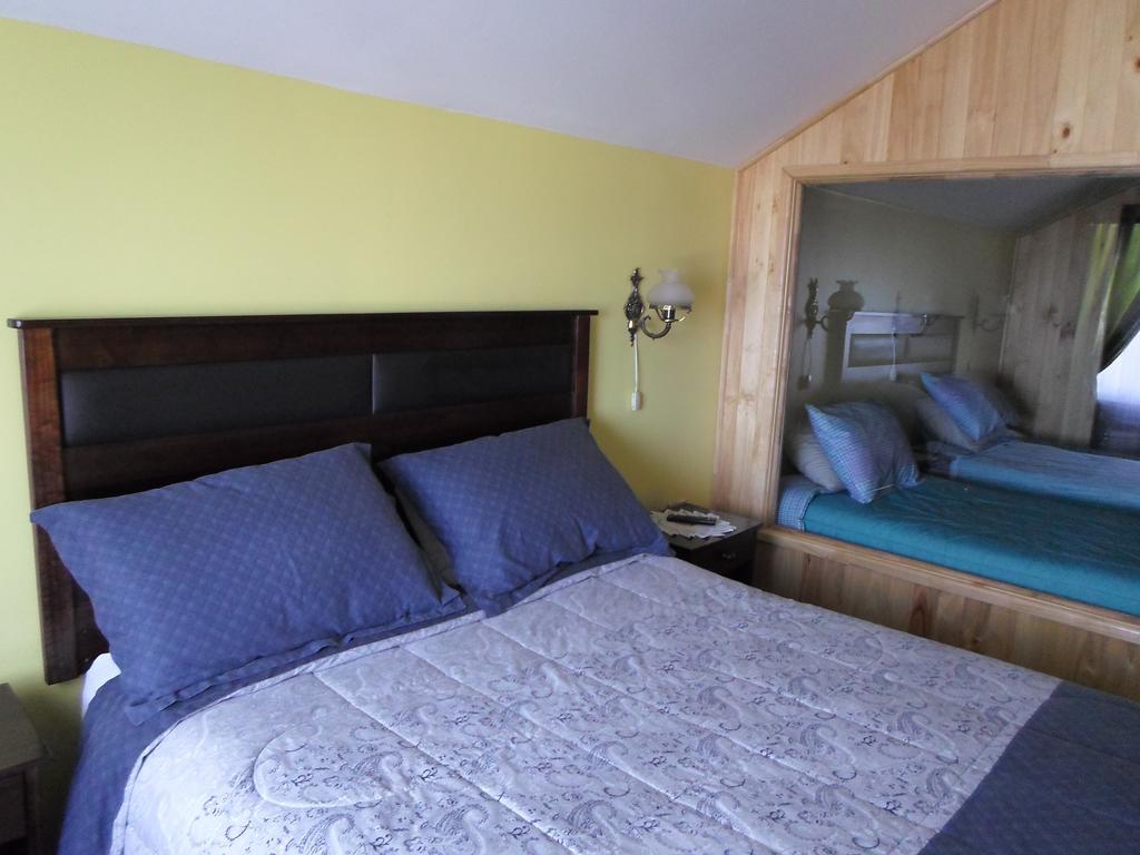 Hotel Don Teo Puerto Montt Habitación foto